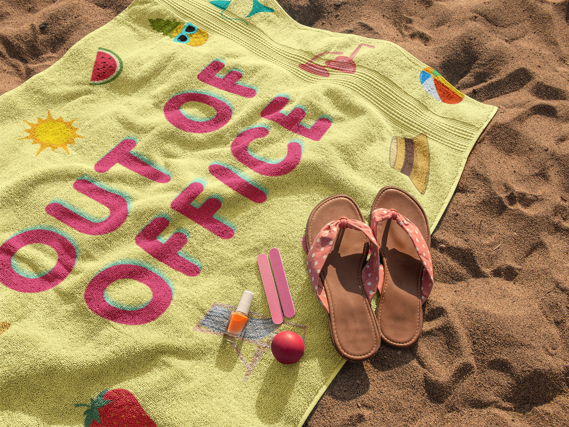 Yellow microfiber beach towel with 'Out of Office' text and summer icons, styled with pink sandals, nail polish, and beach accessories on sand.